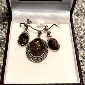 Sterling silver necklace and earring set with green amber
